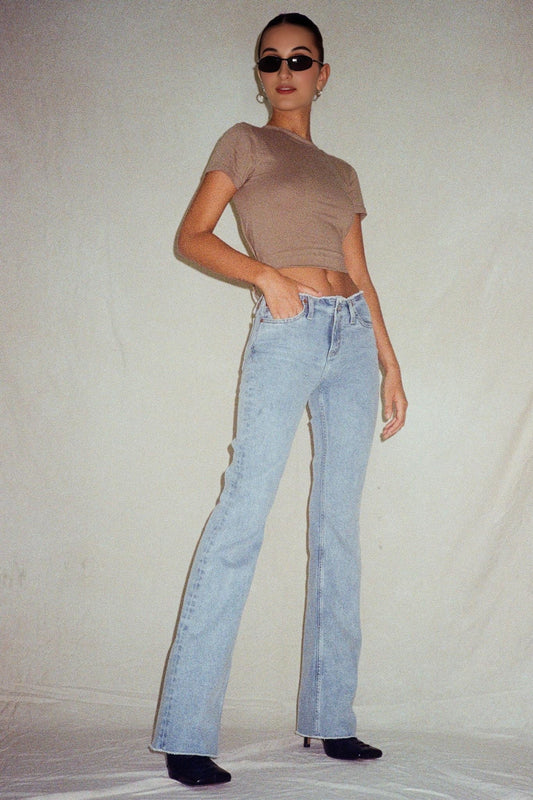 Frayed Low Rise Jeans in Light Wash Blue